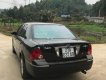 Ford Laser 1.8AT 2004 - Cần bán gấp Ford Laser 1.8AT đời 2004, màu đen, 250tr