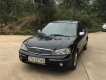 Ford Laser 1.8AT 2004 - Cần bán gấp Ford Laser 1.8AT đời 2004, màu đen, 250tr