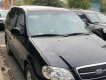 Kia Carnival 2008 - Bán Kia Carnival đời 2008, màu đen số tự động