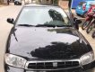 Kia Spectra 2003 - Cần bán lại xe Kia Spectra 2003, màu đen