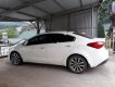 Kia K3 1.6 AT 2014 - Bán Kia K3 1.6 AT đời 2014, màu trắng số tự động