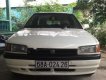 Mazda 323 1.6 MT 2001 - Cần bán gấp Mazda 323 1.6 MT năm 2001, màu trắng