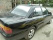 Mitsubishi Proton 1997 - Bán xe Mitsubishi Proton đời 1997, màu đen 