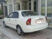 Daewoo Lanos 2002 - Cần bán xe Daewoo Lanos năm sản xuất 2002, màu trắng xe gia đình