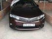 Toyota Corolla altis 2014 - Bán xe Toyota Corolla altis đời 2014, màu nâu