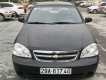 Chevrolet Lacetti 1.6 2012 - Cần bán gấp Chevrolet Lacetti 1.6 đời 2012, màu đen xe gia đình