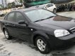 Chevrolet Lacetti 1.6 2012 - Cần bán gấp Chevrolet Lacetti 1.6 đời 2012, màu đen xe gia đình