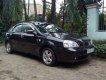 Chevrolet Aveo EX 2004 - Cần bán lại xe Chevrolet Aveo EX 2004, màu đen xe gia đình