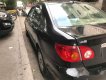 Toyota Corona  G 1.8  2004 - Cần bán gấp Toyota Corona G 1.8 sản xuất 2004, màu đen số sàn