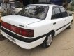 Mazda 323 1.6 MT 1995 - Bán Mazda 323 1.6 MT sản xuất 1995, màu trắng 