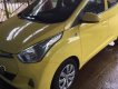 Hyundai Eon   2012 - Bán lại xe Hyundai Eon đời 2012, màu vàng