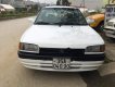 Mazda 323 1.6 MT 1995 - Bán Mazda 323 1.6 MT sản xuất 1995, màu trắng 