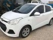 Hyundai Grand i10 2014 - Cần bán Hyundai Grand i10 sản xuất 2014, màu trắng, nhập khẩu