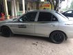 Mitsubishi Lancer GLXI 2001 - Đang có nhu cầu bán Lancer GLXI 2001, màu bạc