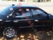 Kia Spectra 1.6 MT 2003 - Cần bán Kia Spectra 1.6 MT đời 2003, màu đen, giá 128tr