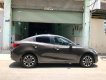 Mazda 2 AT 2016 - Bán Mazda 2 AT sản xuất năm 2016, màu nâu xe gia đình