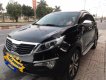 Kia Sportage 2.0AT 2011 - Cần bán gấp Kia Sportage 2.0AT đời 2011, màu đen, nhập khẩu nguyên chiếc, giá chỉ 530 triệu