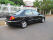 Kia Spectra 2005 - Bán Kia Spectra năm sản xuất 2005, màu đen, 154 triệu