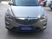 Mazda CX 5 2.0 AT AWD 2015 - Cần bán lại xe Mazda CX 5 2.0 AT AWD năm sản xuất 2015, màu ghi vàng