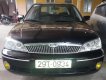 Ford Laser GHIA 2003 - Cần bán xe Ford Laser GHIA sản xuất năm 2003, màu đen, 215 triệu