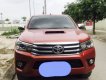 Toyota Hilux 3.0G AT 2016 - Bán Toyota Hilux 3.0G AT năm 2016, màu đỏ, nhập khẩu Thái số tự động, 800 triệu