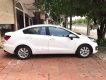 Kia Rio 1.4 AT 2015 - Cần bán gấp Kia Rio 1.4 AT đời 2015, màu trắng, nhập khẩu nguyên chiếc