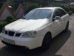 Daewoo Lacetti   1.6 EX  2005 - Cần bán gấp Daewoo Lacetti 1.6 EX năm 2005, màu trắng xe gia đình