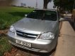 Daewoo Lacetti EX 2010 - Gia đình bán Daewoo Lacetti 1.6 sản xuất năm 2010, màu vàng cát