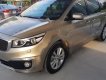 Kia Rondo CRDi 2.2AT 2016 - Bán ô tô Kia Rondo CRDi 2.2AT đời 2016, màu vàng