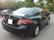 Toyota Corolla XLI 1.6 2011 - Cần bán lại xe Toyota Corolla XLI 1.6 năm 2011, màu đen, nhập khẩu chính chủ, 550tr