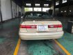 Toyota Camry LE 2.2 MT 1998 - Bán Toyota Camry LE 2.2 MT đời 1998, màu vàng, nhập khẩu