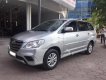 Toyota Innova 2.0E 2014 - Bán Toyota Innova 2.0E đời 2014, màu bạc số sàn