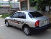 Daewoo Lanos SX 2003 - Bán xe Daewoo Lanos SX đời 2003, màu bạc