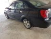 Daewoo Lacetti 2007 - Cần bán gấp Daewoo Lacetti sản xuất 2007, màu đen xe gia đình