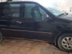 Kia Carnival 2005 - Cần bán Kia Carnival năm sản xuất 2005, màu đen xe gia đình, giá chỉ 340 triệu