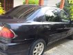 Mazda 323 1999 - Cần bán gấp Mazda 323 đời 1999, màu đen, giá tốt