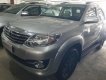 Toyota Fortuner 2.7V 4X2 AT 2016 - Cần bán Toyota Fortuner 2.7V 4x2 đời 2016, màu bạc xe gia đình, 910tr