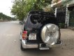 Mitsubishi Pajero 2004 - Cần bán Mitsubishi Pajero đời 2004, màu đen số sàn