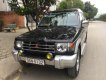 Mitsubishi Pajero 2004 - Cần bán Mitsubishi Pajero đời 2004, màu đen số sàn