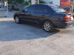 Mazda 323 1999 - Bán xe Mazda 323 sản xuất năm 1999, màu đen, nhập khẩu nguyên chiếc, 99tr