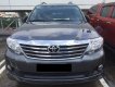 Toyota Fortuner 2014 - Gia đình cần bán Fortuner 2014, số tự động máy xăng, màu xám lông chuột