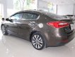 Kia K3 1.6 AT 2014 - Bán Kia K3 1.6 đời 2014, màu nâu số tự động, giá chỉ 520 triệu