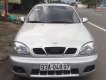 Daewoo Lanos SX 2005 - Cần bán Daewoo Lanos SX năm sản xuất 2005, màu bạc xe gia đình