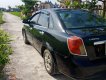 Daewoo Lacetti 2009 - Cần bán xe Daewoo Lacetti 2009, màu đen