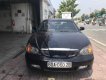 Daewoo Magnus 2.0 2004 - Bán Daewoo Magnus 2.0 năm sản xuất 2004, màu đen số sàn, 140 triệu