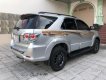 Toyota Fortuner 2.7V 4x4 AT 2015 - Bán Toyota Fortuner 2.7V 4x4 AT sản xuất năm 2015, màu bạc xe gia đình, giá 800tr