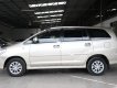 Toyota Innova 2.0E 2014 - Cần bán lại xe Toyota Innova E 2.0MT sản xuất 2014, màu vàng