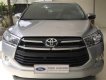 Toyota Innova 2.0E 2016 - Cần bán gấp Toyota Innova 2.0E đời 2016, màu bạc như mới, 695 triệu