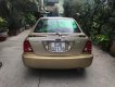 Ford Laser 2002 - Bán xe Ford Laser sản xuất 2002, màu vàng, 200tr