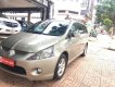 Mitsubishi Grandis 2.4 AT 2006 - Bán Mitsubishi Grandis 2.4 AT đời 2006, màu vàng, giá 375tr